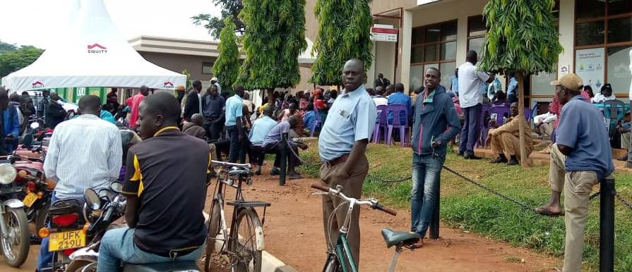 Lango claimants spend sleepless nights at bank to access compensation